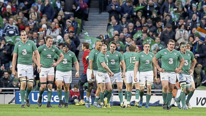 Conor Murray celebrates with Keith Earls and his Irish team-mates after scoring a try during the 2016 RBS Six Nations match at the Aviva Stadium, Dublin 