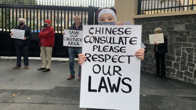 Residents protest outside the Chinese Consulate on Belfast's Malone Road. Picture by Hugh Russell&nbsp;