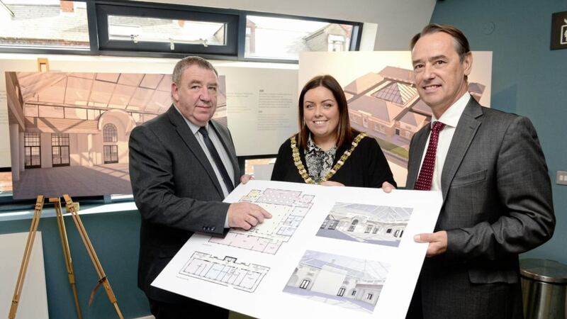 Gerry McConville from Falls Community Council, Belfast lord mayor Deirdre Hargey, and Executive Office deputy secretary Mark Browne launching the regeneration project at St Comgall&#39;s in west Belfast 