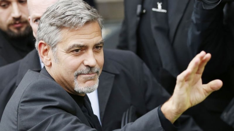 George Clooney uses awards speech to warn about hate in age of Donald Trump