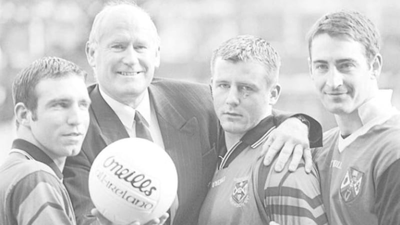 ALL FOR MALONE... Down legend and Queen&rsquo;s old boy Sean O&rsquo;Neill (second left) pictured with current QUB players Enda McNulty, Justin McNulty and Con Coleman at the launch of the 1999 Amstel Sigerson Cup, which will be hosted by the Malone seat of learning 