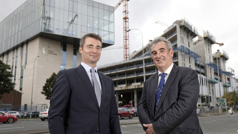 Announcing the appointment of Barclays as banking partner of Ulster University are Graeme McLaughlin (Barclays relationship director) and Peter Hope (UU chief financial officer). Photo: Darren Kidd/Press Eye 