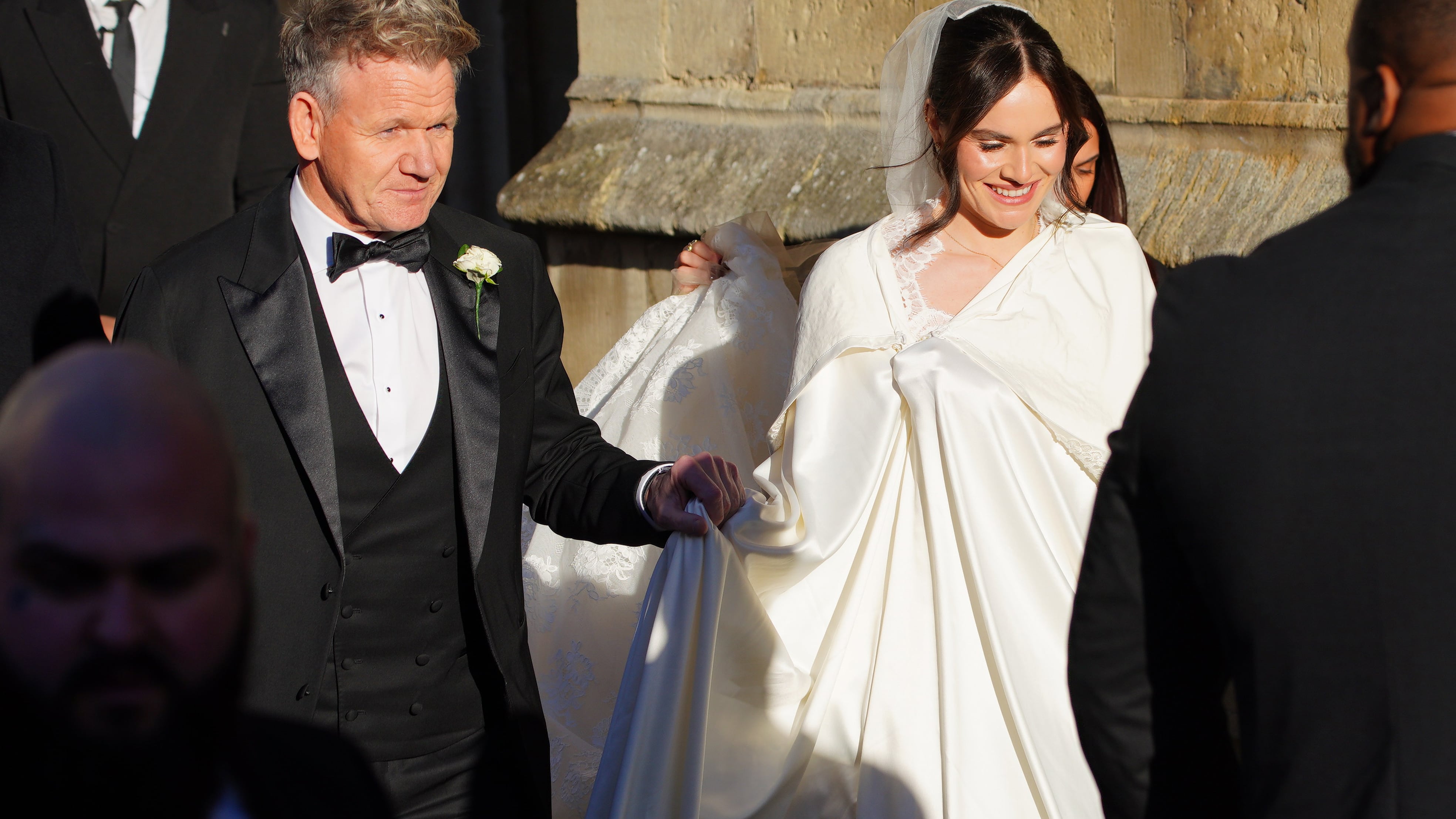 Celebrity chef Gordon Ramsay walked hand-in-hand with his 25-year-old daughter as they entered Bath Abbey for the ceremony