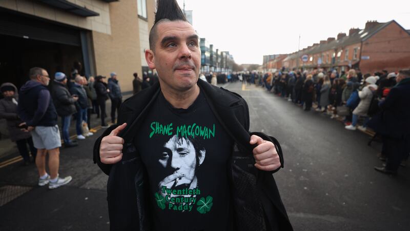 Fan John Farrell waited outside Shelbourne Park Stadium for the funeral procession of Shane MacGowan (Liam McBurney/PA)