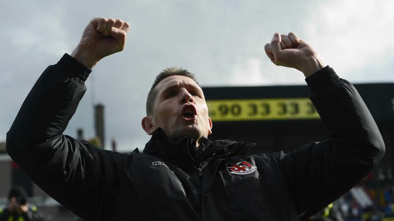 Crusaders manager Stephen Baxter celebrates Saturday's victory over Linfield at Seaview<br />Picture by Pacemaker&nbsp;