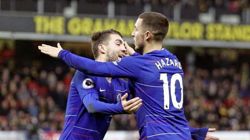 Chelsea's Eden Hazard (right) celebrates scoring his side's first goal of the game with Mateo Kovacic during the Premier League match against Watford on December 26 2018. Hazard went on to score again, with his second-half penalty the winning goal in a 2-1 victory