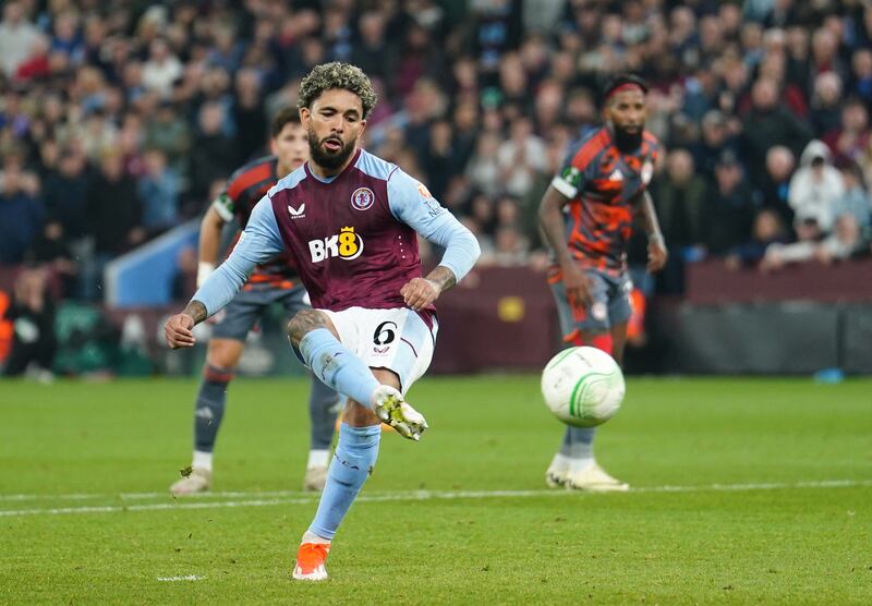 Aston Villa’s Douglas Luiz takes and misses a penalty
