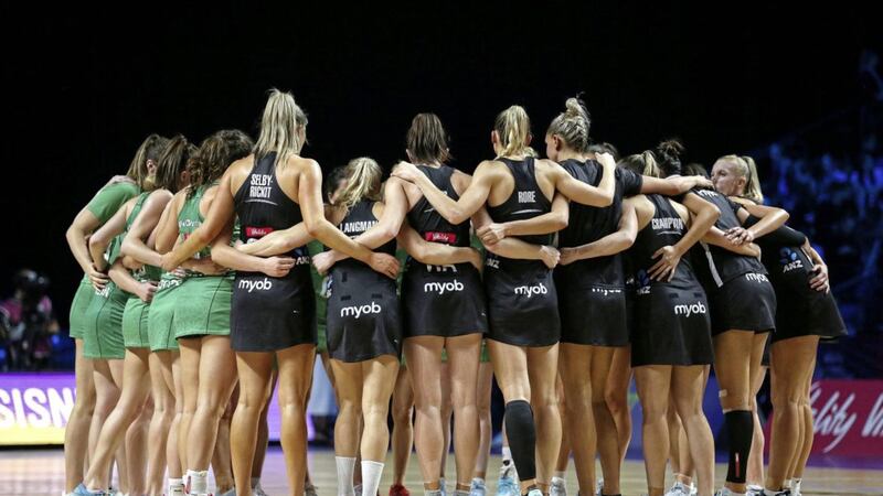 Northern Ireland and New Zealand players huddle during the Netball World Cup. Picture by Nigel French, Press Association 