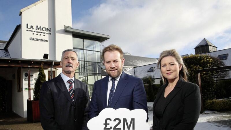 Announcing the new contract at La Mon are Rainbow Communications sales and marketing director Stuart Carson (centre) with the hotel&#39;s managing director Geoffrey Weir and sales director Megan Beverland 