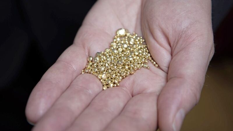 EDITORIAL USE ONLY..File photo dated 21/09/17 of grains of gold. No decision can be made on planning permission for a Co Tyrone gold mine until a minister is available, a Stormont department has said. PRESS ASSOCIATION Photo. Issue date: Wednesday October 3, 2018. Dalradian&Acirc;&nbsp;Gold owns the Curraghinalt site near Gortin and has submitted an application for official approval. See PA story ULSTER Gold. Photo credit should read: David Parry/PA Wire. 