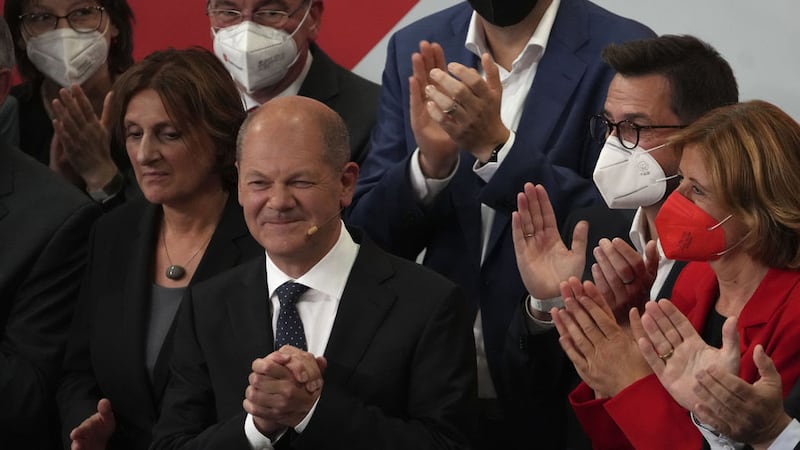 Olaf Scholz, Finance Minister and SPD candidate for Chancellor after addressing his supporters after German parliament election at the Social Democratic Party, SPD, headquarters in Berlin, Sunday, September 26, 2021 (AP Photo/Michael Sohn)&nbsp;