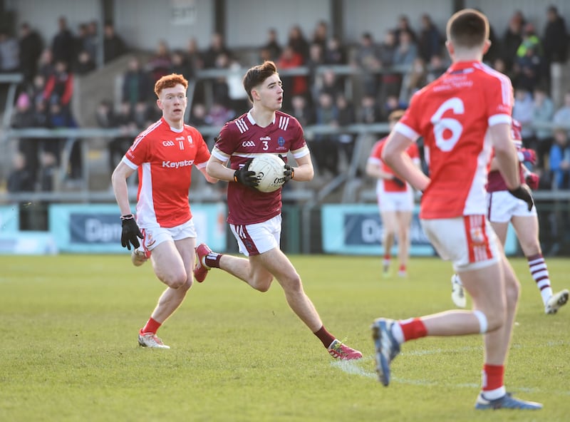 Omagh full back Brian Gallagher runs with the ball