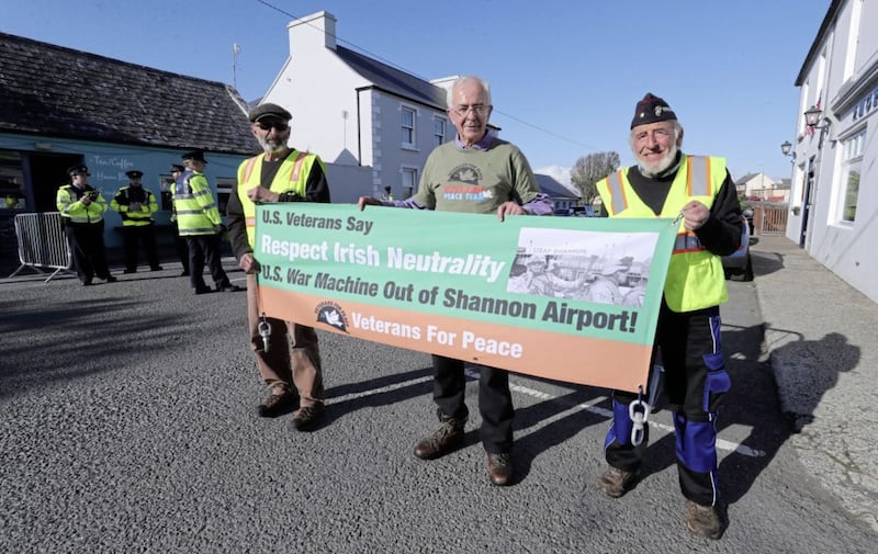 Veterans for Peace protestors (left to right) Tarak Kauff, Edward Horgan and Ken Mayers await the arrival of US President Donald Trump in the village of Doonbeg in County Clare on the first day of his visit to the Republic. Picture by Niall Carson/PA Wire