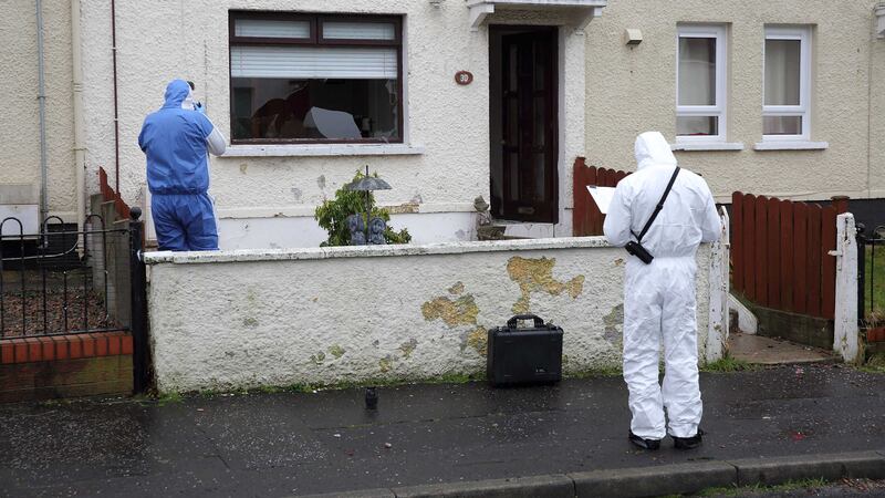 &nbsp;Forensic officers examine the scene of a disturbance in the Woodvale area of Belfast