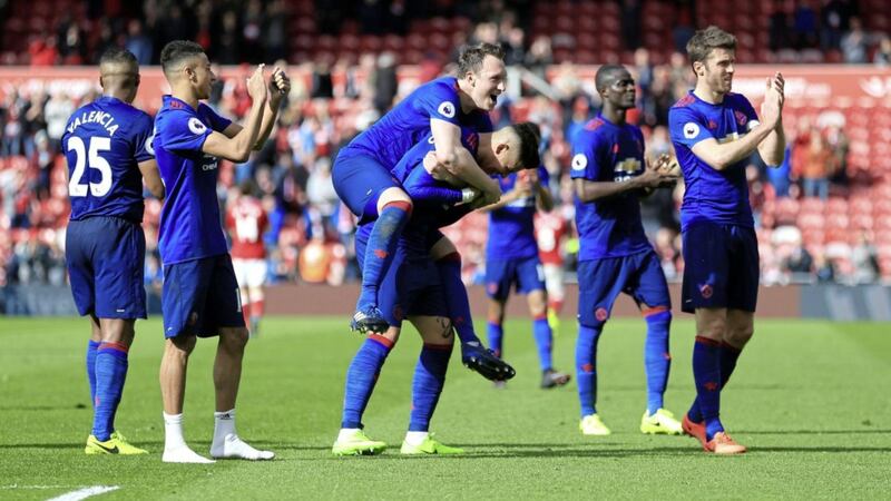 Manchester United&#39;s player celebrate after their 3-1 win over Middlesbrough in the Premier League yesterday 