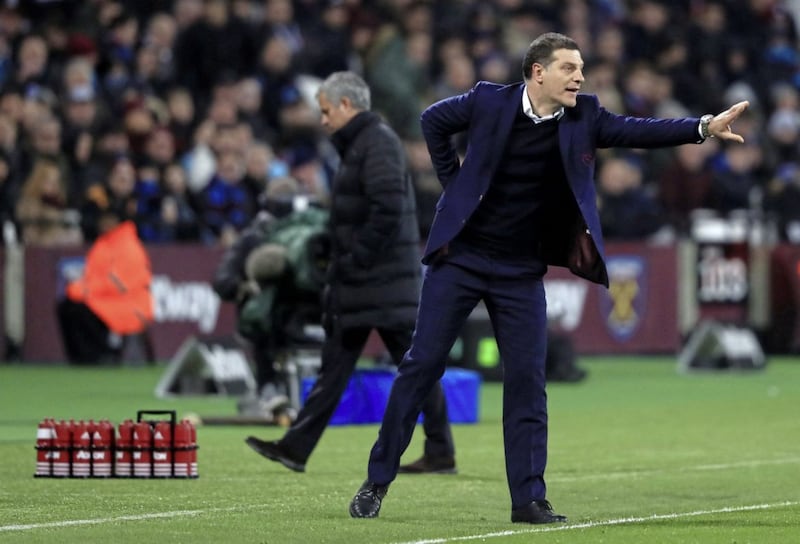 Former West Ham United manager Slaven Bilic is linked with the Celtic job. Jose Mourinho (back) is also a surprise name in the running