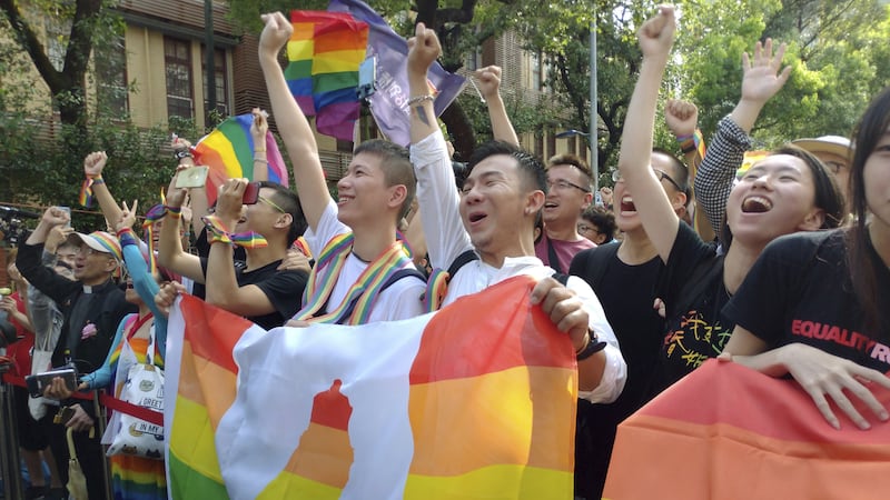 Officials in Taiwan have passed a law allowing same-sex marriage in a first for an Asian country.