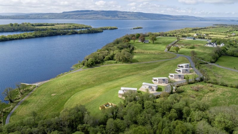 Mullans Bay, its lakeside lodges in the foreground, looking towards Lusty Beg Island and, on the far shore of Lough Erne, Lough Navar Forest viewpoint 