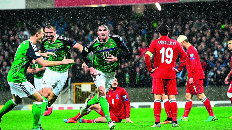 &nbsp; Kyle Lafferty celebrates opening the scoring at Windsor Park last night Picture: Pacemaker