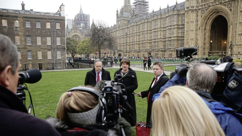 DUP leader Arlene Foster and deputy leader Nigel Dodds speaking to the media on College Green in Westminster, London yesterday PICTURE: Yui Mok/PA 