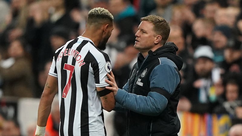 Newcastle boss Eddie Howe (right) is delighted to have tied up the future of midfielder Joelinton (left)