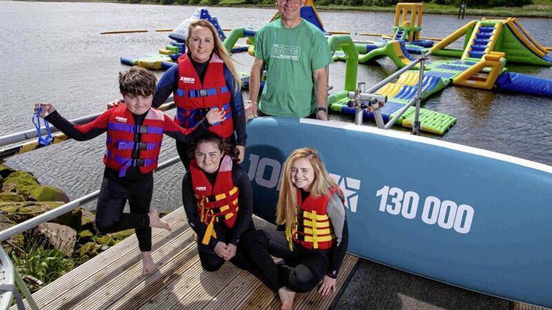 The Edge Watersports has celebrated its 130,000th customer. The lucky customer was Emma McCauley and her family from Newtownabbey. Rob Skelly, owner of The Edge Watersports at Crannagh Activity Centre is pictured with; Ollie, Emma, Rebecca and Aimee McCauley. 
