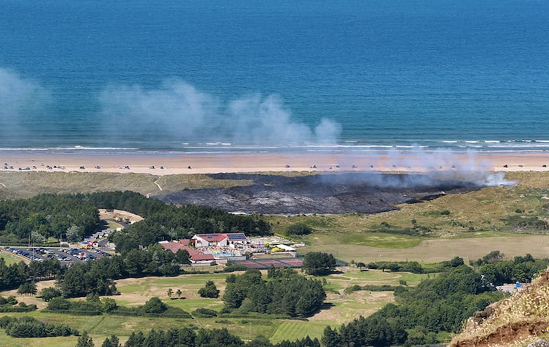 &nbsp;Seven fire engines are tackling the fire at Benone Strand. Picture by Margaret McLaughlin