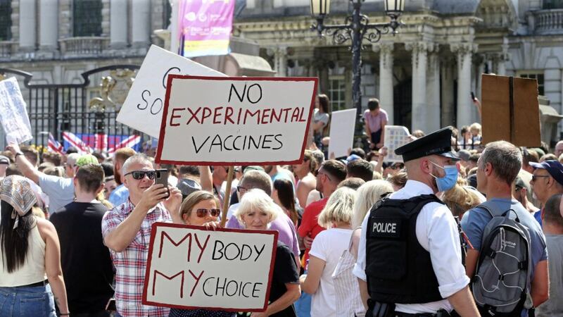 Protesters against vaccinations, mask-wearing and health passports gathered at the city hall before marching to Botanic Gardens.  Pictures Mal McCann 