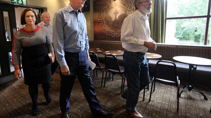 Bobby Storey arrives at the Roddy McCorley Social Club,&nbsp;west Belfast, yesterday with Gerry Adams TD, Martin McGuinness MLA, and Mary Lou McDonald TD PICTURE: Ann McManus 