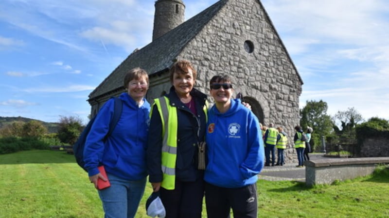 Dana at Saul with pilgrim guides Martina Purdy, left, and Elaine Kelly, right. Picture: Neal Barclay