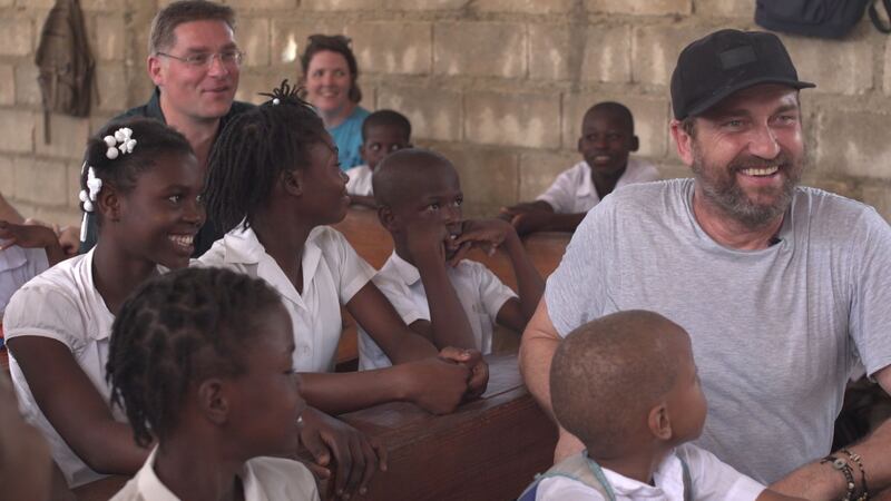 The actor was visiting children in Haiti with the charity Mary’s Meals.