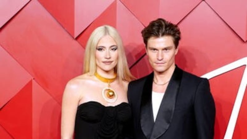 Pixie Lott and Oliver Cheshire are looking forward to welcoming their first child (Ian West/PA)