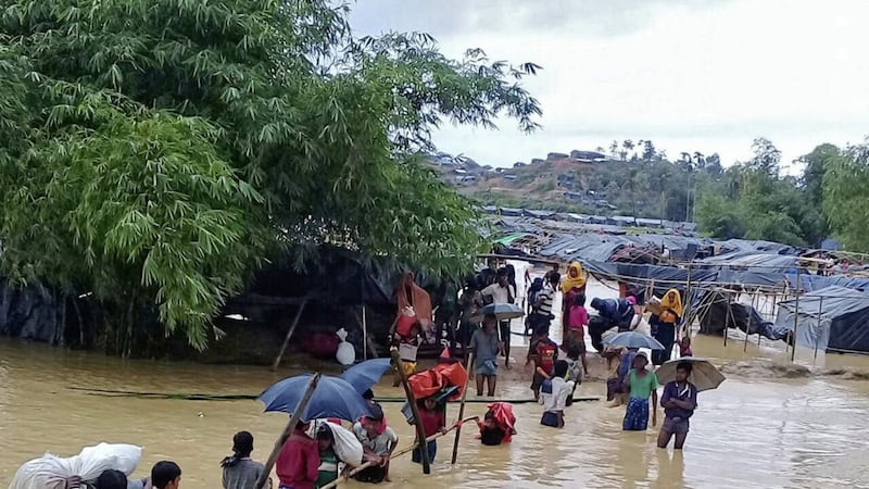 ROHINGYA CRISIS: The Balukhali makeshift refugee camp in Cox&#39;s Bazar, Bangladesh, has been flooded due to monsoon rain. Some people are living with the flood water but others are moving to find safer areas. Picture by Christian Aid. 