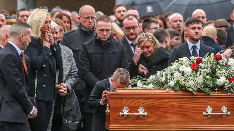 Relatives at the funeral of murder victim Jim Donegan in west Belfast today. Picture by Mal McCann