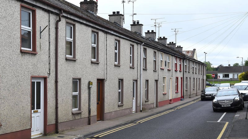 PACEMNAKER BELFAST  16/6/2015.St Patrick&#39;s Terrace, Lisnaskea, where the bodies of two men where discovered last night, the house the bodies were found in is the second from left    Photo by Ronan McGrade/Pacemaker Press/Fermanagh Herald. 