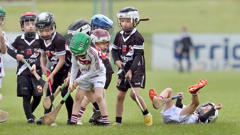 Youngsters from Slaughtneil and Kevin Lynch Dungiven clubs taking part in a mini match at half time during the Derry Senior Hurling Championship final played at Owenbeg on Sunday 17th September 2023. Picture Margaret McLaughlin
