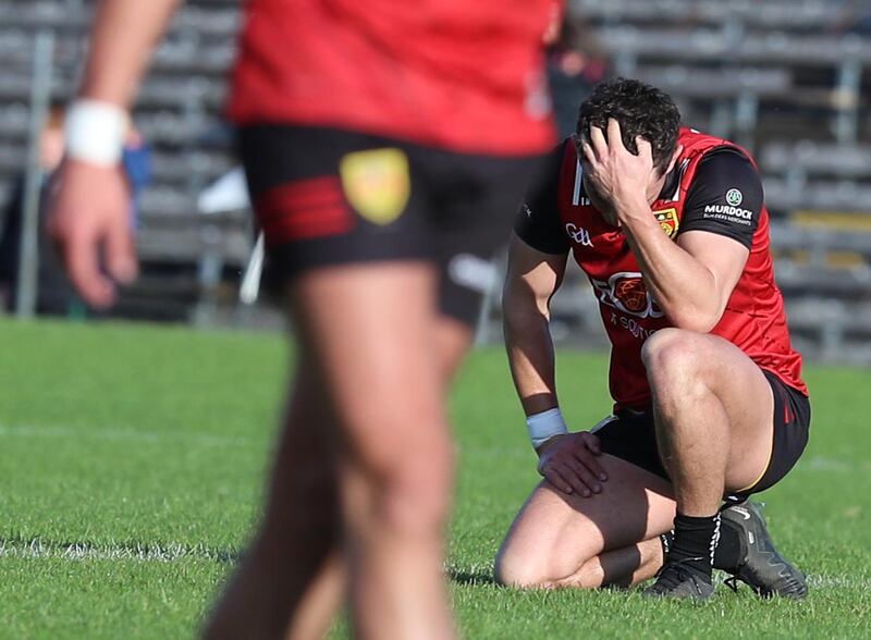 Crestfallen Down skipper Pierce Laverty  was bitterly disappointed as the Mournemen fell short. Pic Philip Walsh