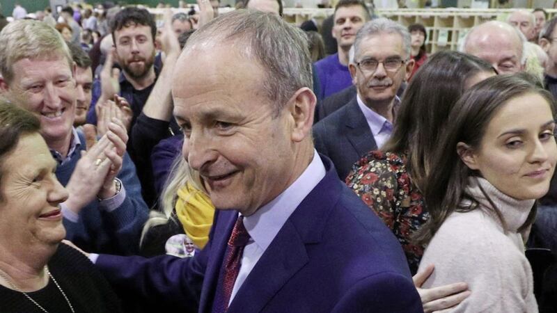 Fianna Fail leader Micheal Martin celebrates with his wife Mary O&#39;Shea after being elected for the Cork South-Central constituency, during the Irish General Election count at the Nemo Rangers GAA Club in Cork, Ireland. PA Photo. PA Photo. Picture date: Sunday February 9, 2020. See PA story IRISH Election. Photo credit should read: Yui Mok/PA Wire. 
