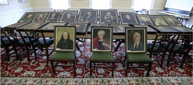 The 22 portraits that remain unclaimed at the former Clifton House residential home in Belfast. Picture by Hugh Russell 