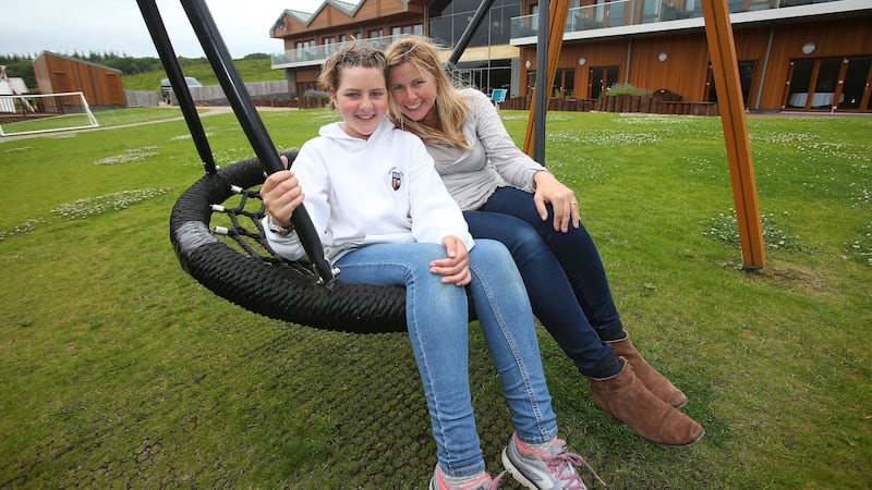 <span style="font-family: Arial, sans-serif; ">Nola Harrison with her daughter Zara at Daisy Lodge in Newcastle. Picture Mal McCann</span>