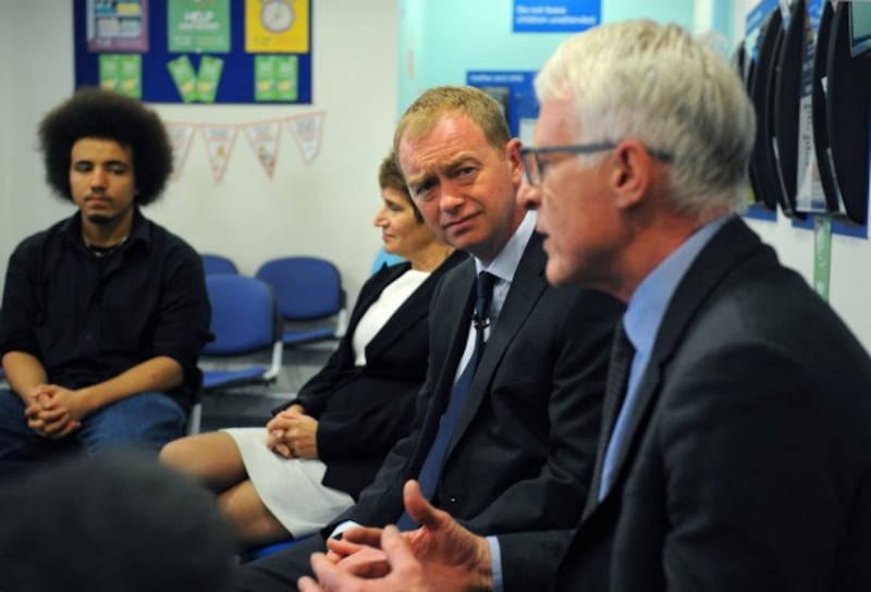 Farron speaking with NHS staff