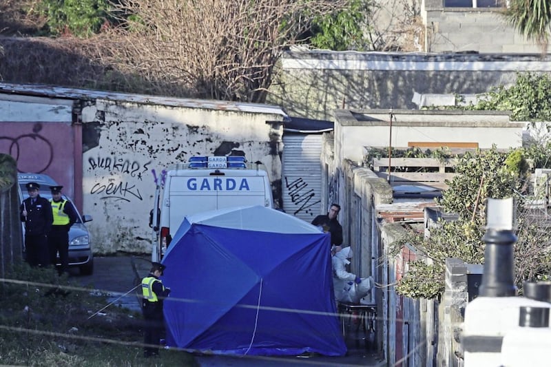 Forensics officers and Garda at the scene on Trinity Terrace in the Drumcondra area of Dublin where human remains, believed to be linked to the disappearance of a 17-year-old boy from Co Louth, have been found in a burnt out car. Gardai are awaiting DNA results to see if human limbs found in Coolock on Monday also belong to the missing teenager. PA Photo. Picture date: Wednesday January 15, 2020. See PA story POLICE BodyIreland. Photo credit should read: Brian Lawless/PA Wire. 