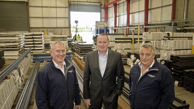 Co Antrim business Hannon Transport benefited from last year&#39;s HSBC fund. Pictured are Adrian Hannon (left) and Aodh Hannon (right) from the business with Chris McQuay from HSBC 