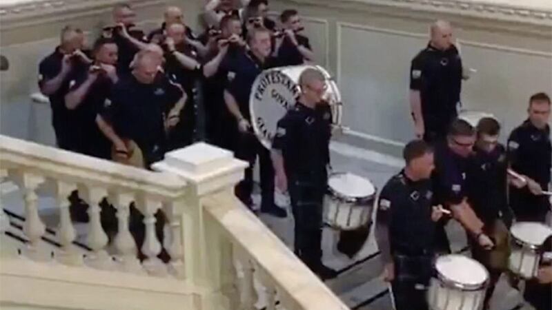 The George Telford Memorial Orange Lodge has apologised to Belfast city council after a loyalist flute band paraded in city hall during a dinner event it had organised 