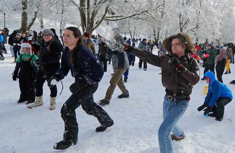 People taking part in the snowball fight