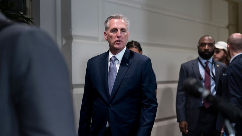 Speaker of the House Kevin McCarthy leaves a meeting with House Republicans (J Scott Applewhite/AP/PA)