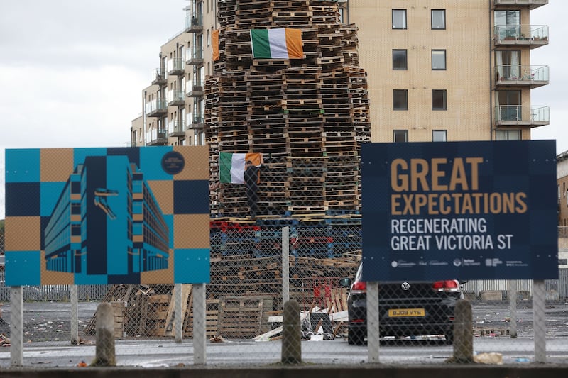 Irish tricolours place on a bonfire in Sandy Row in south Belfast
