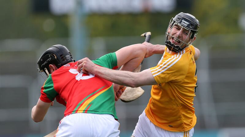 Antrim's Odhr&aacute;n McFadden attempts to get clear of Carlow's Diarmuid Byrne during the 2015 Leinster SHC<br />Picture by John &nbsp;McIlwaine&nbsp;