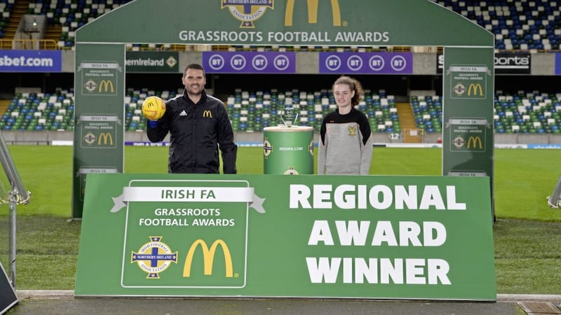 Wes Gregg Coach of the Year Regional award winner, Rachel Rodgers from Mid Ulster Ladies FC, alongside former Northern Ireland international striker David Healy.                                     