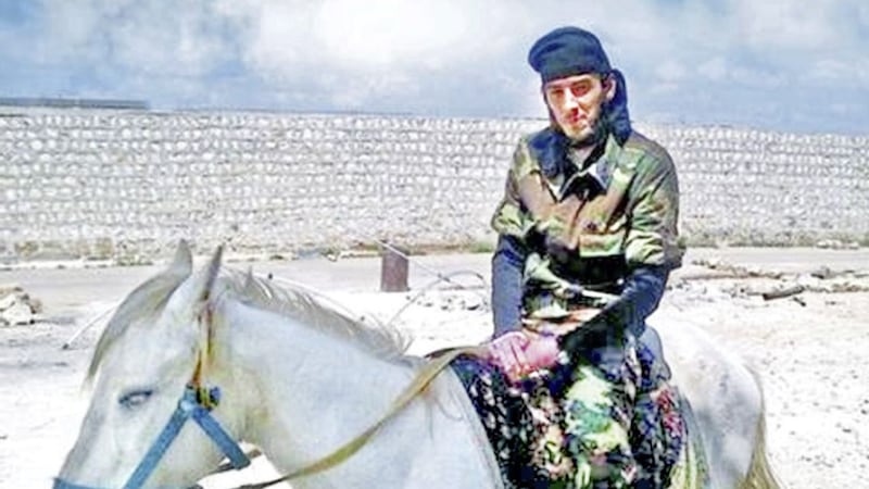 Eamon Bradley pictured in combat fatigues on horseback during what the prosecution said was a terror training exercise in Syria 
